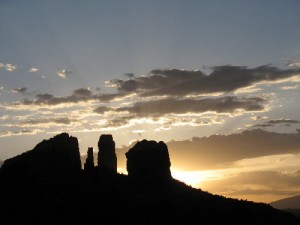 The sun sets behind Cathedral Rock.