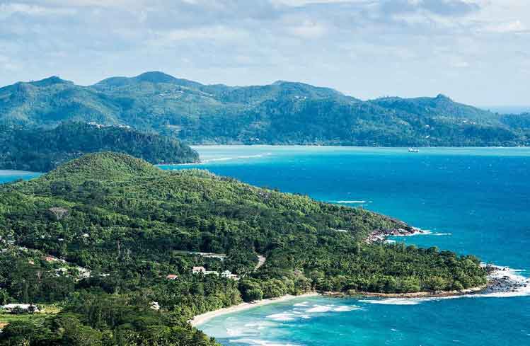 The lush eastern coastline of Mahé, the largest island of the Seychelles. Image by Oliver Berry / Lonely Planet.