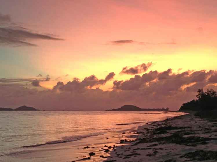 Sunset on the east coast of Praslin, the Seychelles' second largest island. Image by Oliver Berry / Lonely Planet.