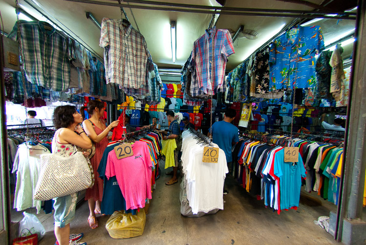 Used clothing for sale at Bangkok’s Chatuchak Weekend Market. Image by Austin Bush