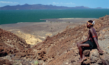 A young Turkana man looks out over Lake Turkana (Image: Richard Trillo)