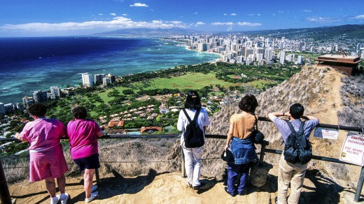 Hikers at the summit of Diamond Head crater.