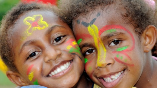 Face paint adds colour to young girls in Port Vila, Vanuatu.