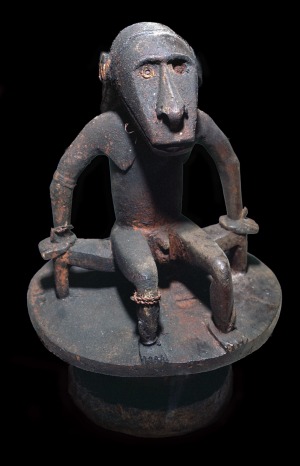 Wooden figure of a sea spirit, with head in the form of a shark, from San Cristobel Island.