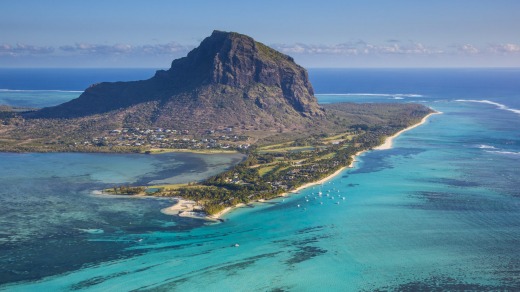 Arriving by air, the turquoise seas and verdant landscape of Mauritius are full of holiday promise.