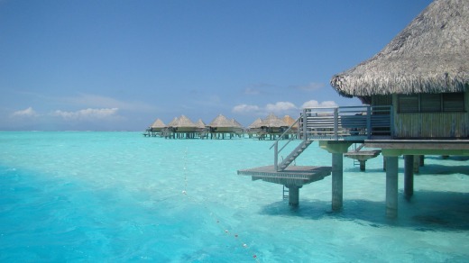 Bungalows built over the Bora Bora lagoon.