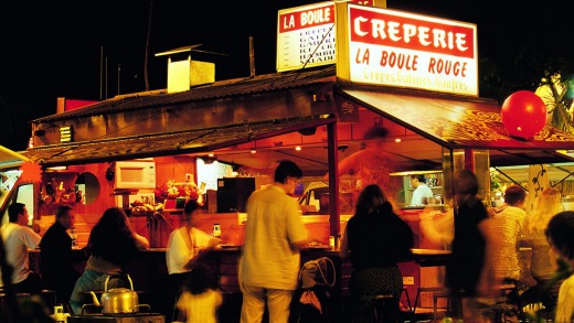 Open-air dining at Les Roulottes, Papeete.