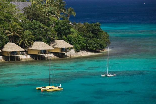 Vanuatu, Vila Bay and Iririki Island: Lend a hand by spending your tourist dollars. Most hotels and tourist activities ...