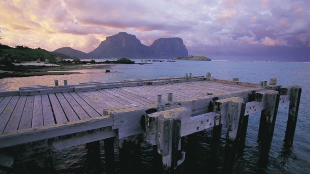 Tranquil beauty: View of the jetty with Mount Gower and Mount Lidgbird in the distance.