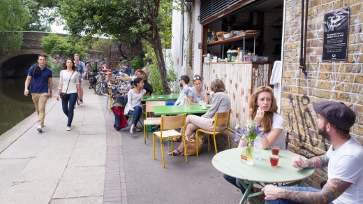 Trendy cafes and restaurants line the towpath of the Regent's Canal in Shoreditch.