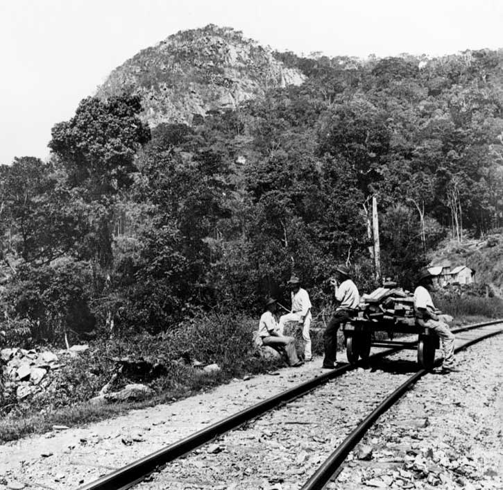 Historical photograph of workers resting while building the Cairns Railway.
