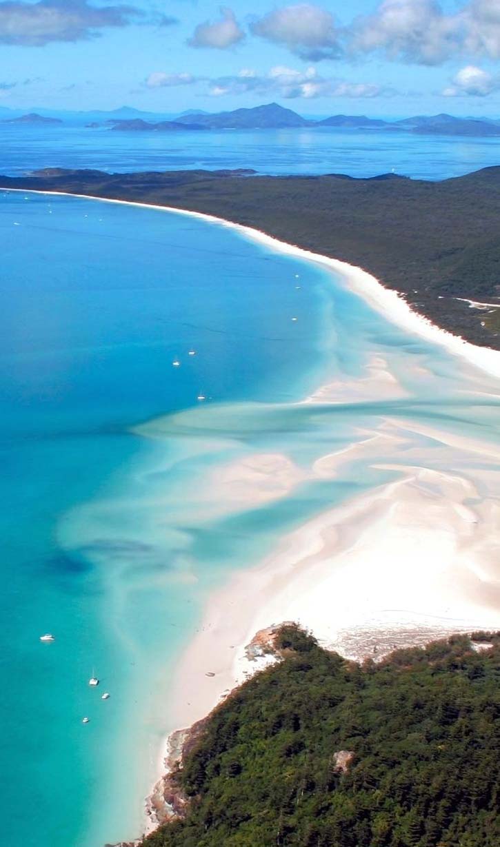 White sandbars meet turquoise water at Whitehaven Beach in Queensland.