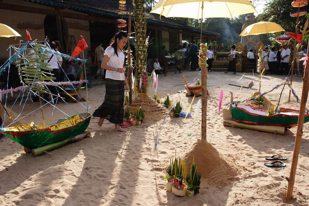 Chedis made of sand and small model boats in front of Wat Atui, an active Khmer temple next to the ruins of a small Angkor era temple, which stands in a village between Siem Reap and Phnom Krom.