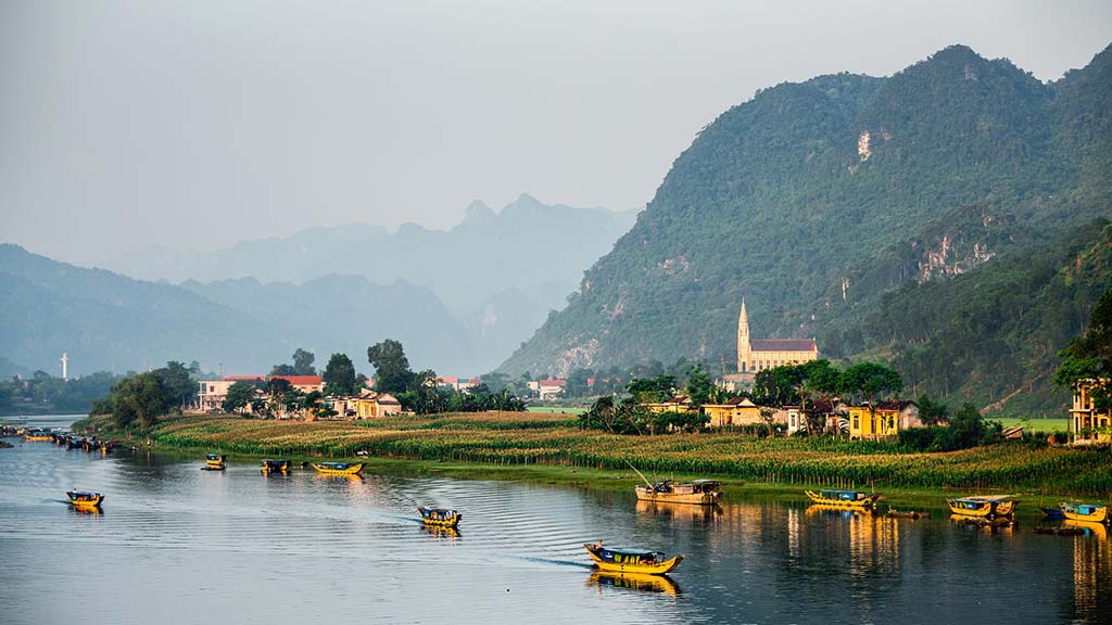 Boats along the river in the National Park of Phong Nha Ke Bang. Photo © mihtiander/123rf.