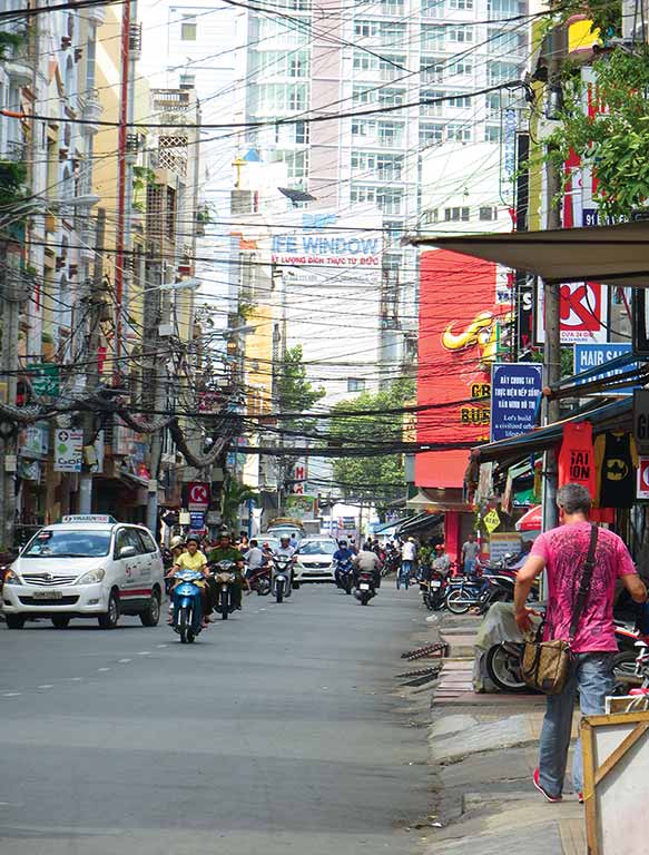 Vietnam's city streets are quite busy. Photo © Dana Filek-Gibson.