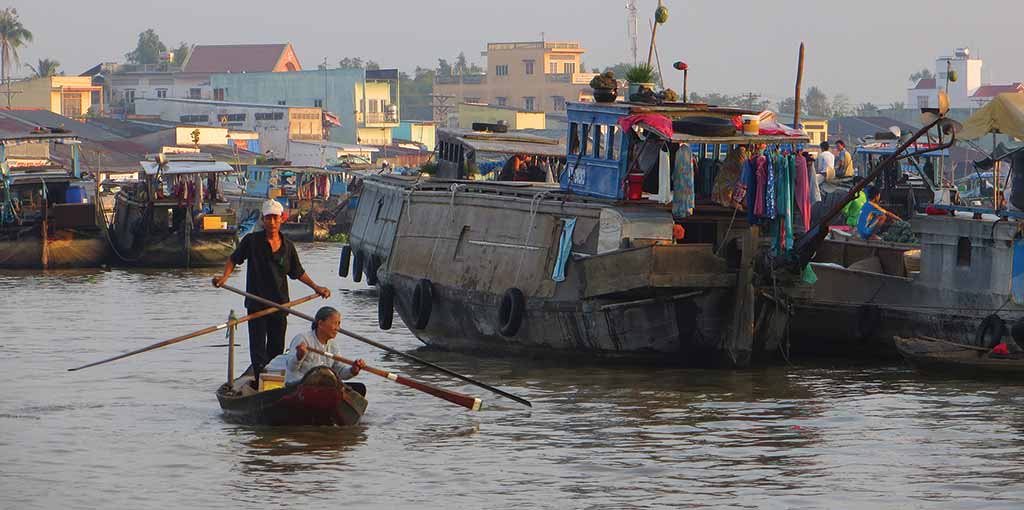 Vendors await their early-morning customers at Cai Rang Floating Market. Photo © Dana Filek-Gibson.