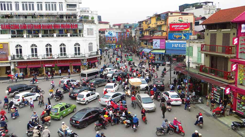 Downtown Hanoi at rush hour. Photo © Dana Filek-Gibson.