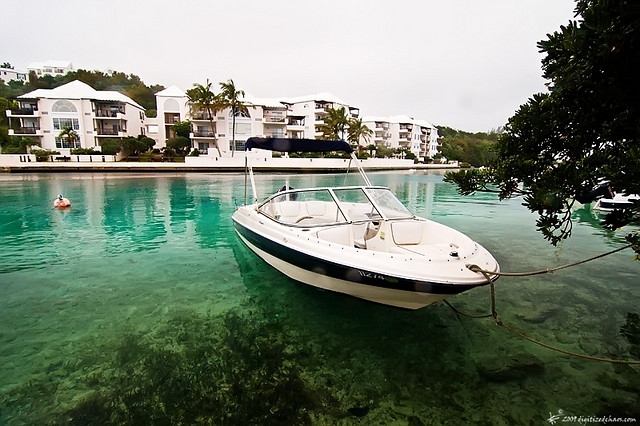 A boat docked in the beautiful turquoise waters of St. George's, Bermuda.