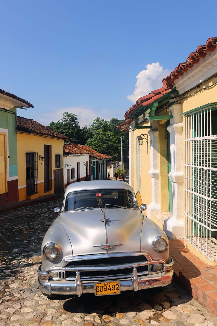 A classic silver chevy parked in Sancti Spiritus, Cuba.