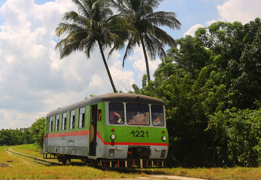 A simple single-car train provides service between towns in Cuba.