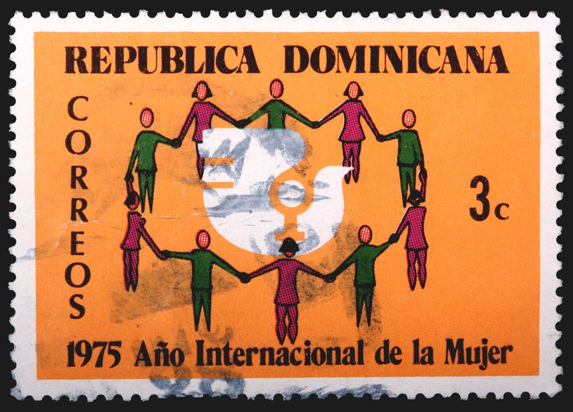 Photo of vintage RD stamp with artwork of women holding hands in a circle.