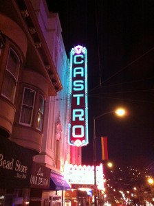A vertical vintage theater sign reads Castro in neon letters.