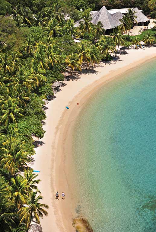 The beach at Rosewood Little Dix Bay Resort. Photo © Todd Van Sickle.