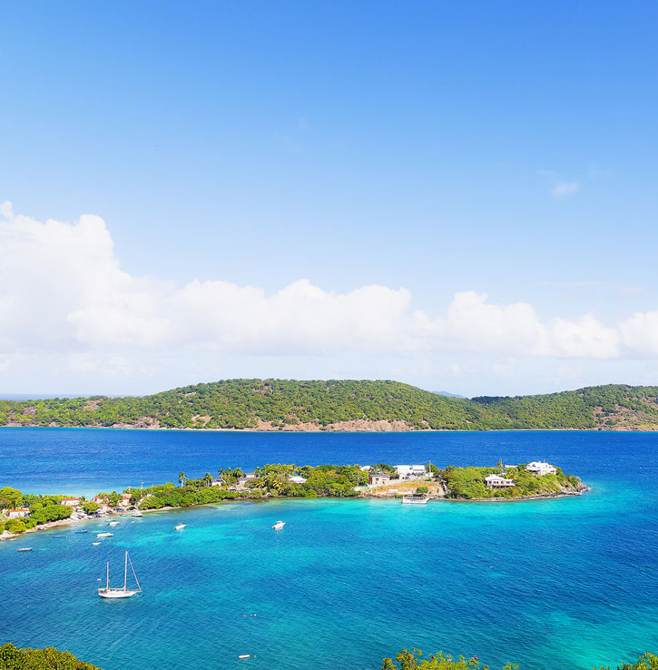 Boats moored in the shallow waters of St. Thomas, US Virgin Islands.