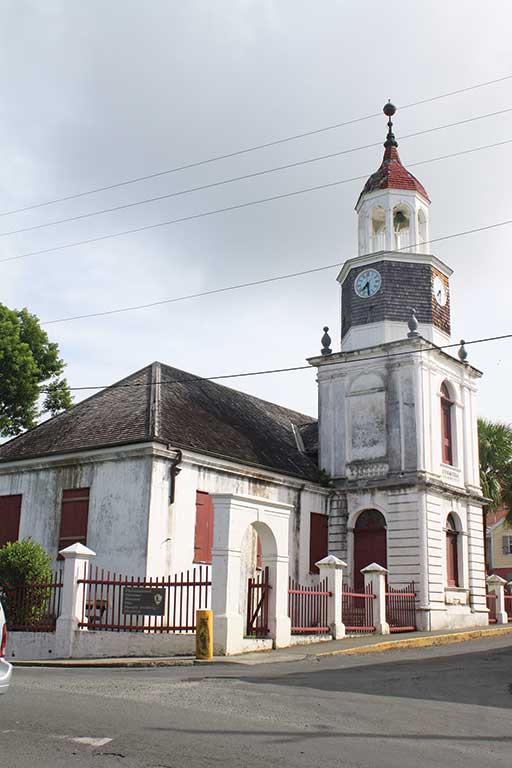 The attractive white Steeple Building was the first Danish Lutheran Church on St. Croix. Photo © Susanna Henighan Potter.