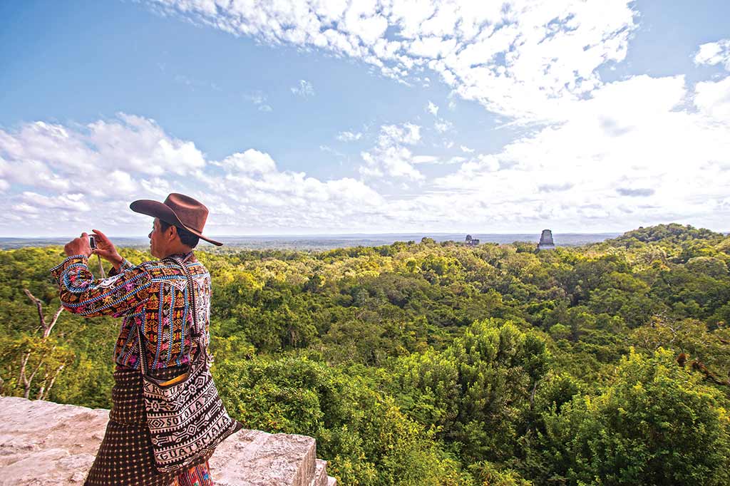 Atop Tikal's Temple IV. Photo © Al Argueta.