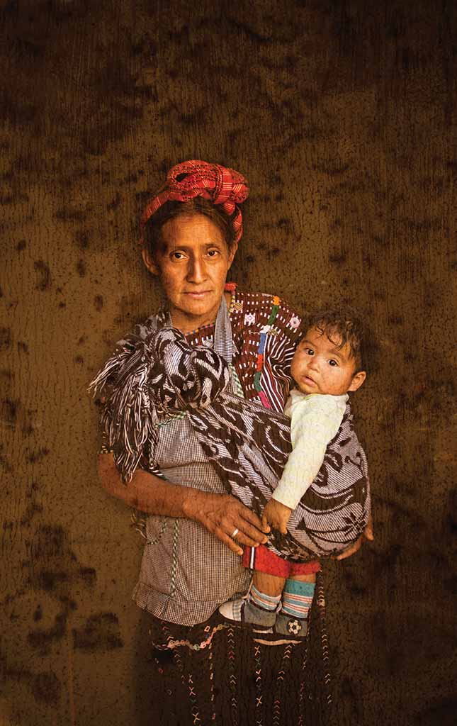 A Mayan woman and child from the Huehuetenango highlands. Photo © Al Argueta.