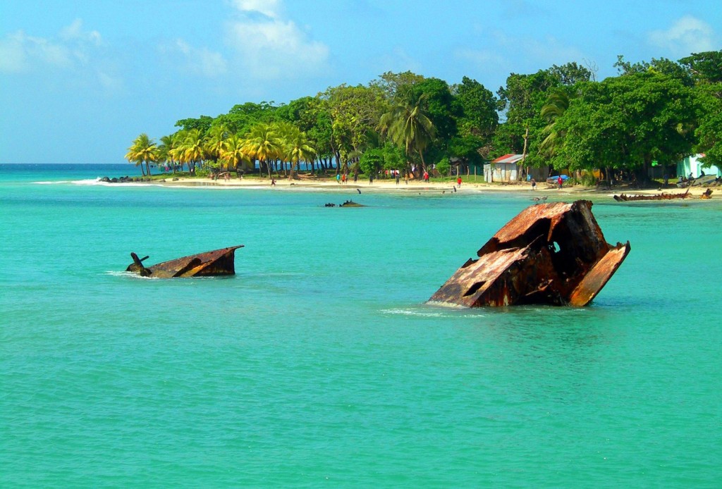 The tops of wreckage emerge from the turquoise water at Nicaragua's Corn Islands.