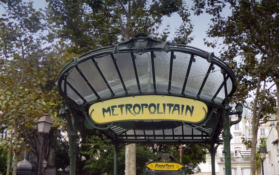 A classic art nouveau Metropolitain entrance leading down into the Abbesses station.