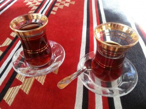 Two tulip shaped cups of tea.