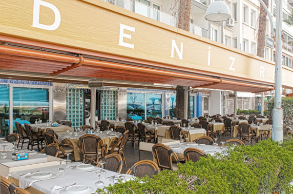 Open-air seating out front of Deniz Restaurant.