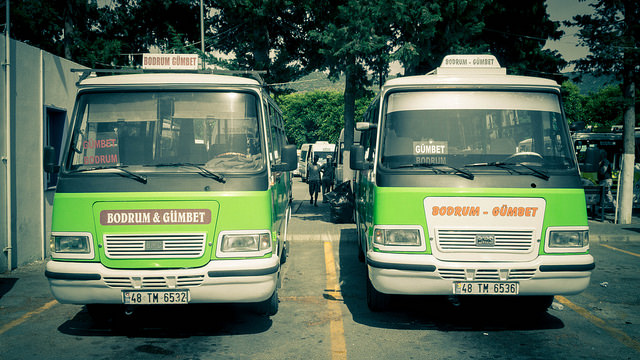 A pair of dolmus (minibuses) parked side by side in Turkey.