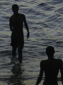 Silhouettes in ocean
