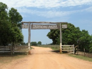 Transpantaneira dirt road and sign