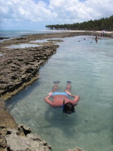 Man snorkeling off the shore of Maceio, capital of Alagoas