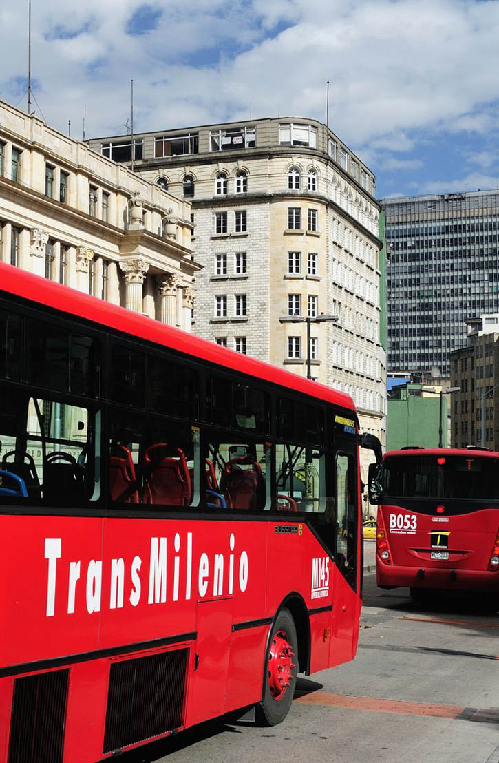 Red TransMilenio buses in Bogotá, Colombia.