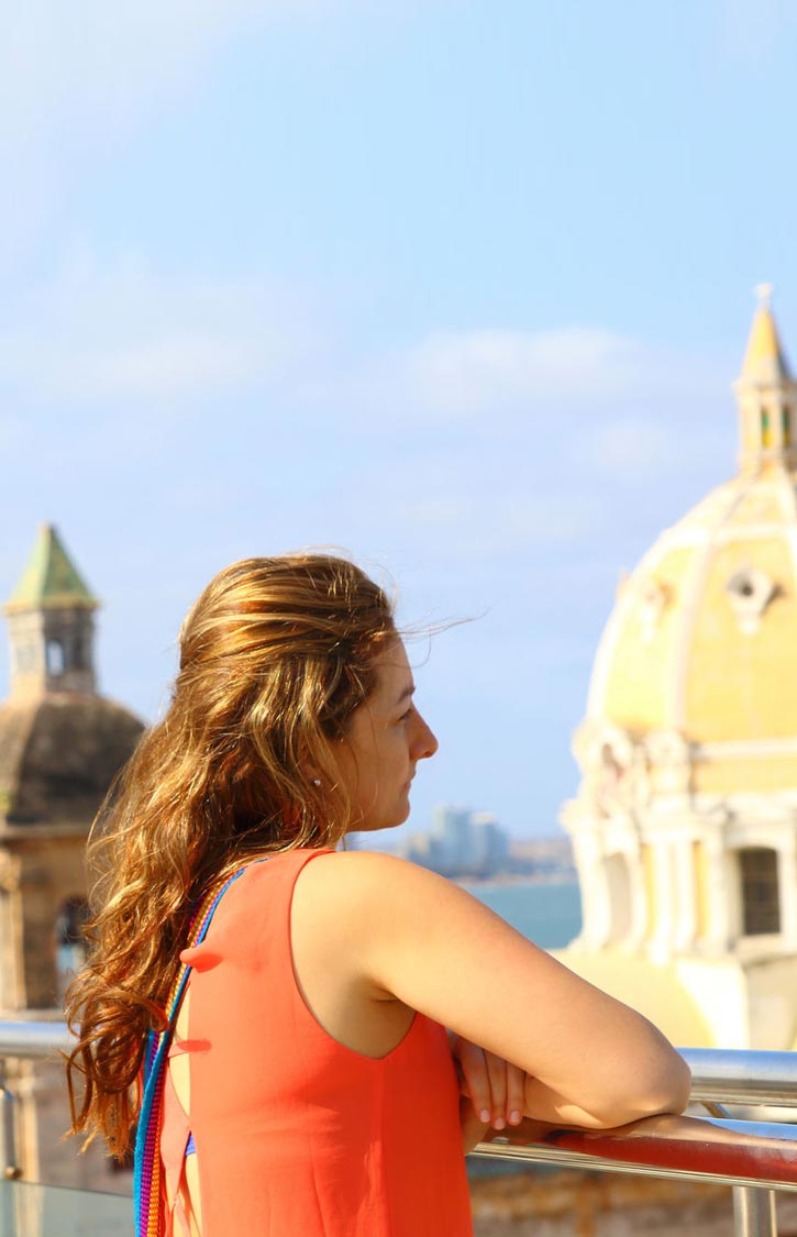 A woman takes in the city of Cartagena, Colombia.