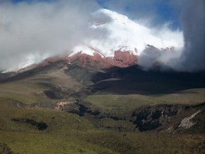 The snow-capped peak of Cotopaxi rises dramatically.