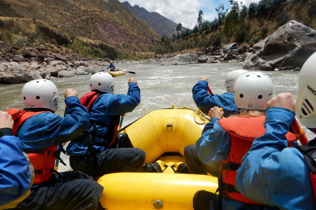 Photo taken from the rear of a raft on the river.