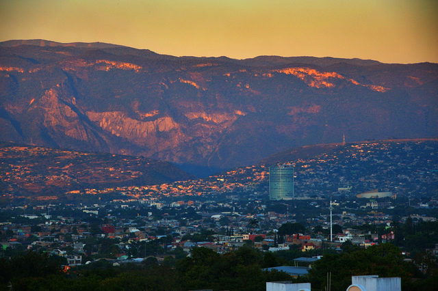 The setting sun hits the mountains beyond the city of Tuxtla Gutierrez.