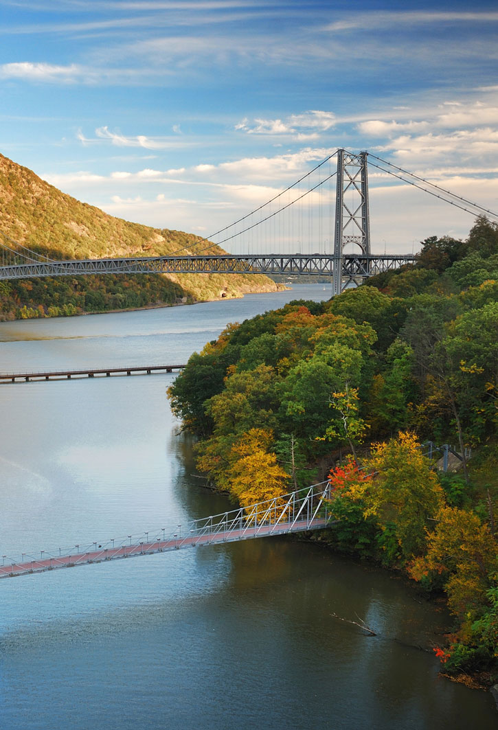 Bridge over the Hudson River with autumn foliage.
