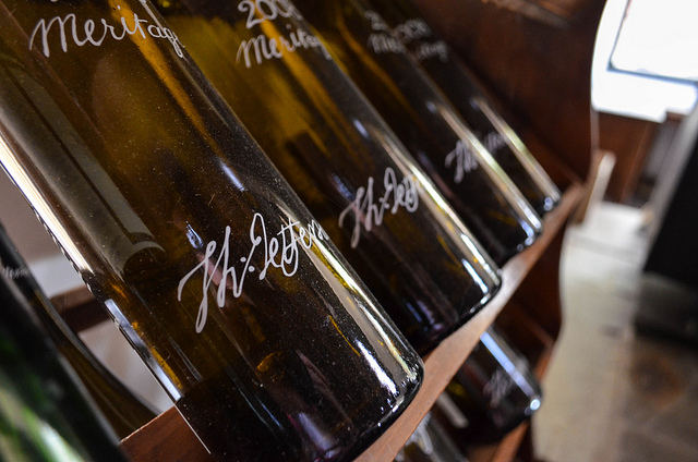 Rows of bottles with Thomas Jefferson's signature are on display.