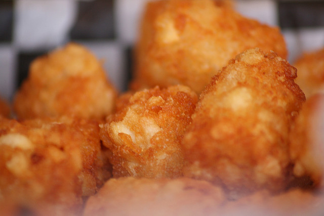 Close up of crispy golden tater tots.