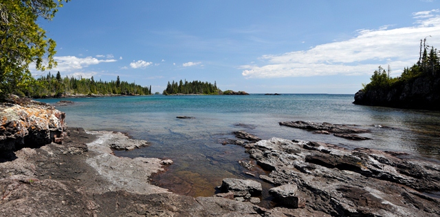 View from the shore across shallow water at Hill Islands in Isle Royale National Park.
