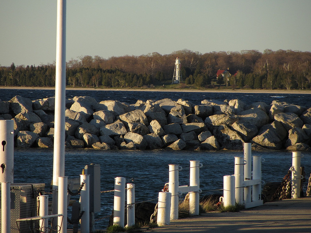 Across the water from Northport a lighthouse is visible on Plum Island.