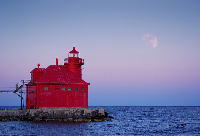 Sturgeon Bay ship canal north pier lighthouse and moonrise.